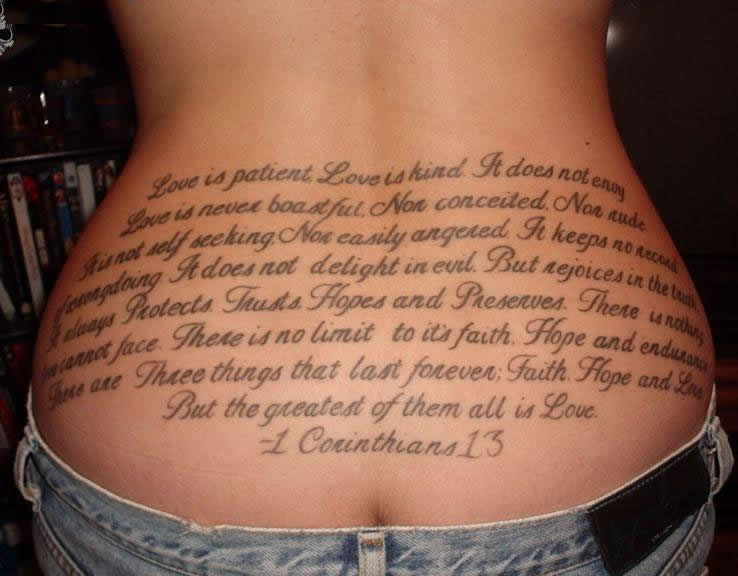 veritas tattoo. lower back tattoo